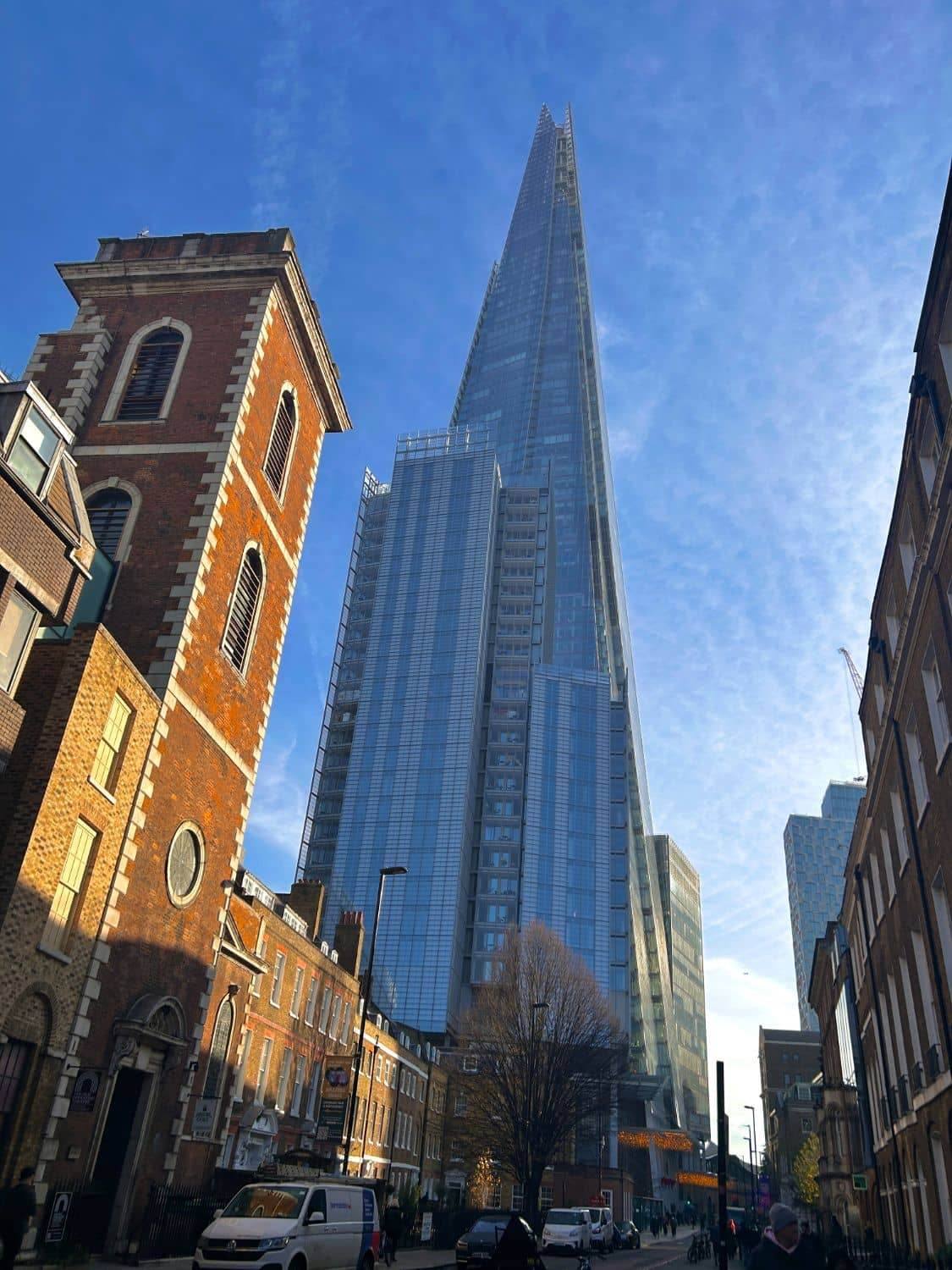Looking up at The Shard from a London street